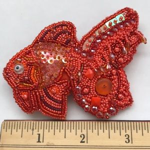 Bead embroidered fish brooch